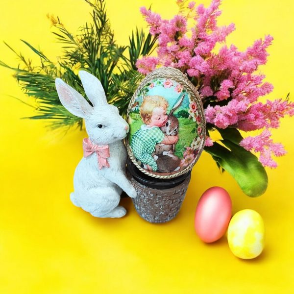 Hand-decorated Easter egg with rice paper and clay embellishments. Beautiful Easter Display