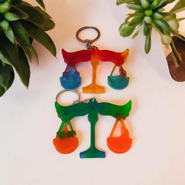 Libra zodiac sign resin keyring with beautiful pans on a balance scale design.