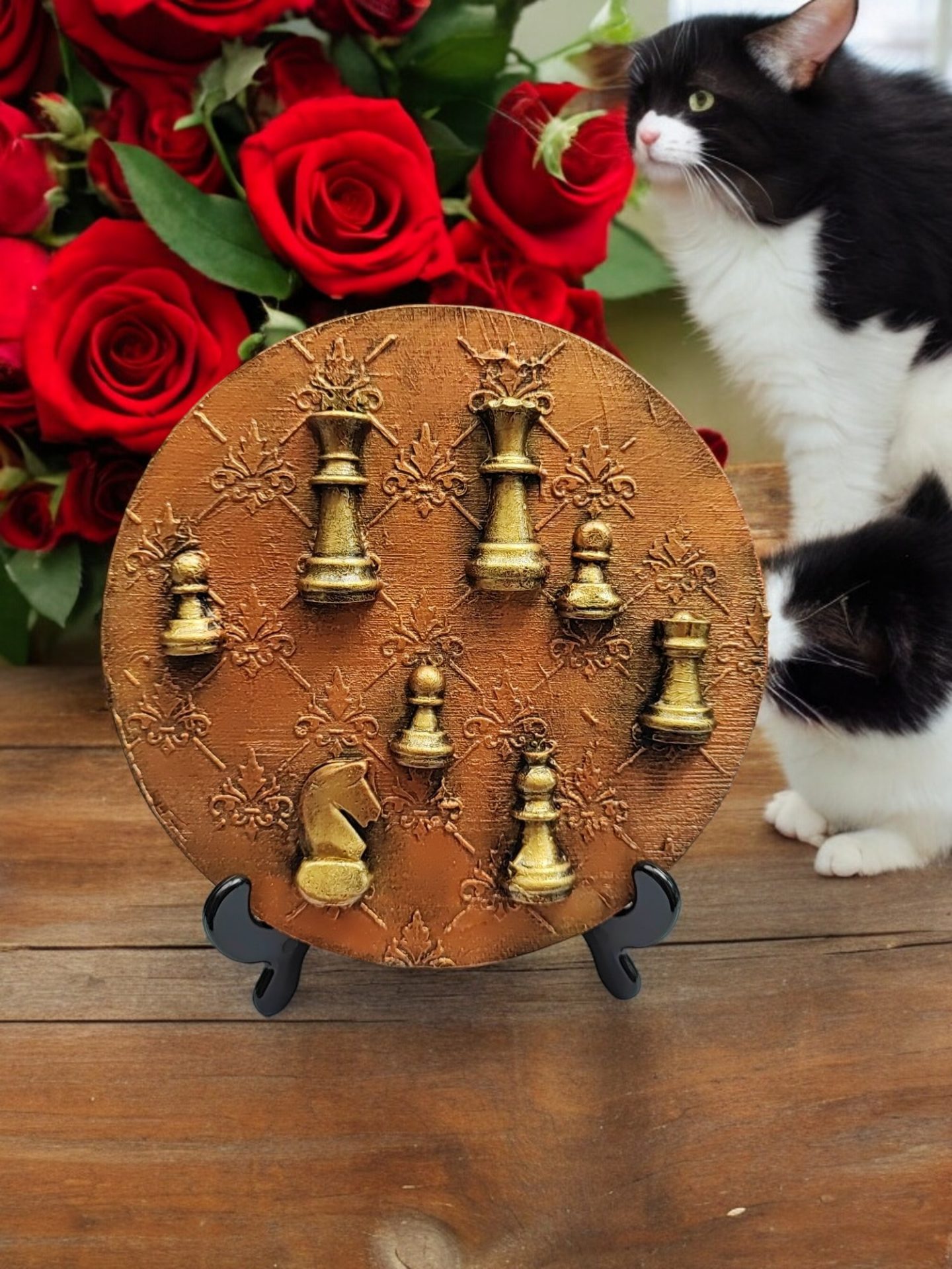 Resin chees pawns on a textured golden-brown decorative wood slice, capturing the strategic beauty of chees in art form.