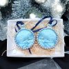Set of two Handcrafted Winter Scene Christmas Baubles featuring winter scene with silver embellishments and blue ribbon.