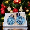 British- themed ornaments Set of 2 handmade British- themed ornaments featuring Big Ben and Royal Guard designs, packaged in a gift box .