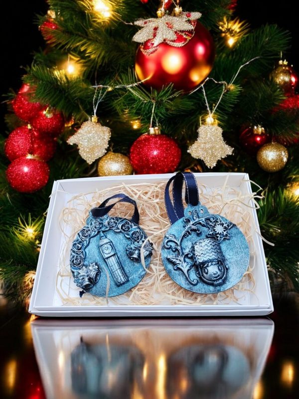 British- themed ornaments Set of 2 handmade British- themed ornaments featuring Big Ben and Royal Guard designs, packaged in a gift box .