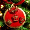 handcrafted Christmas tree ornaments with a red background and gold accents, featuring designs of Big Ben and British crown with holiday motifs.