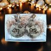 Handcrafted Cherub Ornament Set Set of two handcrafted antique gold cherub Christmas ornaments with floral details in a white gift box
