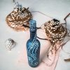 Handcrafted Decorative Bottle with Pearl-Inspired Design - Image 4