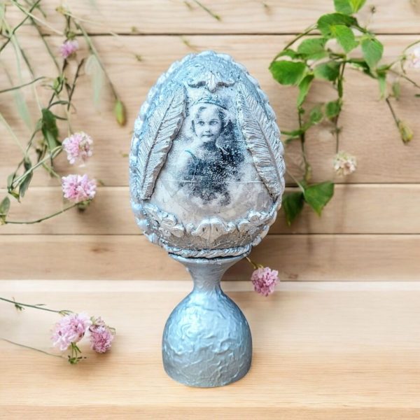 Silver Memory Keepsake Egg with Vintage Photo Design, Handcrafted with Love Handcrafted silver decorative egg with vintage photo design, featuring detailed leaf patterns and a pedestal base.
